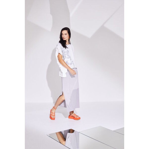 Naya Pocket Jersey Long Vest Dress NAS24167 in mink is a great dress for layering pieces over. It has side splits, vest shoulder straps and a round neckline as well as a patch pocket. Available from colmershill.pro